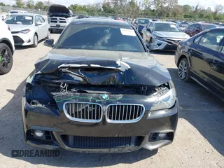 2014 BMW 5 Series 535d with VIN WBAXA5C58ED690447, listed as a IAAI auction lot 41577468 with 149,080 mi miles and . Bid and sale history available at carsss.com. Image 13.