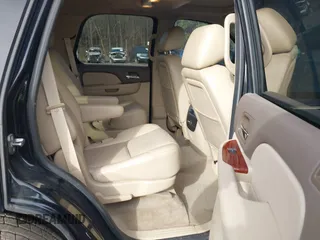 2012 GMC Yukon SLT with VIN 1GKS1CE06CR104447, listed as a IAAI auction lot 41589823 with 183,003 mi miles. Bid and sale history available at carsss.com. Image 8.