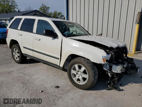 2009 Jeep Grand Cherokee Laredo with VIN 1J8HR48P89C532571, listed as a Copart auction lot 57309544 with 203,423 mi miles and Non Repairable. Bid and sale history available at carsss.com. Image 4.