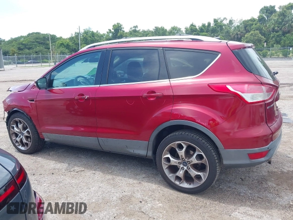 2013 Ford Escape Titanium with VIN 1FMCU0J96DUC67636, listed as a IAAI auction lot 42539425 with 120,593 mi miles and . Bid and sale history available at DreamBid. Image 15.