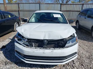 2016 Volkswagen Jetta Sedan 1.4T S w/Technology with VIN 3VW267AJ5GM249423, listed as a IAAI auction lot 41867790 with 61,979 mi miles. Bid and sale history available at carsss.com. Image 12.