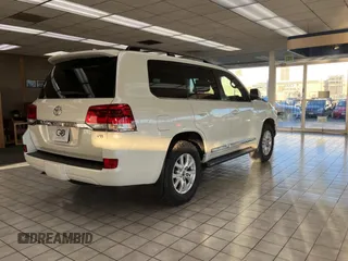 2021 Toyota Land Cruiser with VIN JTMCY7AJ4M4097501, listed as a Copart auction lot 77044004 with 61,823 mi miles and Clean Title. Bid and sale history available at carsss.com. Image 4.