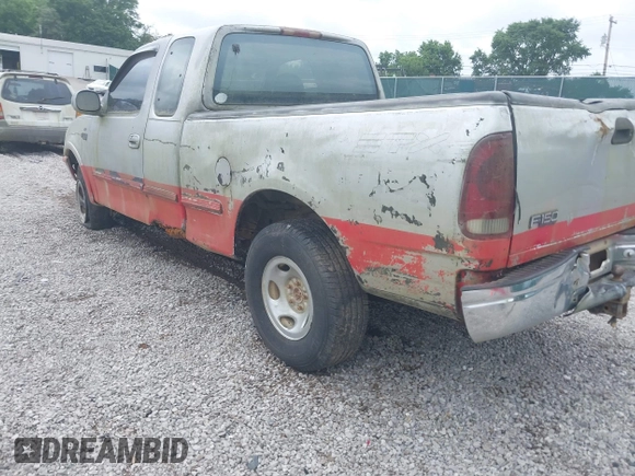 1997 Ford F-150 XL with VIN 1FTDX1869VNA33231, listed as a IAAI auction lot 42697823 with 149,986 mi miles and . Bid and sale history available at DreamBid. Image 14.