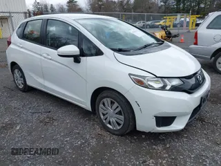 2017 Honda Fit LX with VIN JHMGK5H58HS021117, listed as a IAAI auction lot 42026243 with 94,953 mi miles. Bid and sale history available at carsss.com. Image 1.