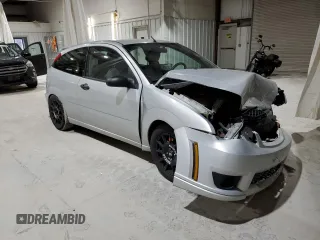 2007 Ford Focus S with VIN 1FAHP31N57W113952, listed as a Copart auction lot 51070245 with 149,809 mi miles and Salvage Title. Bid and sale history available at DreamBid. Image 4.