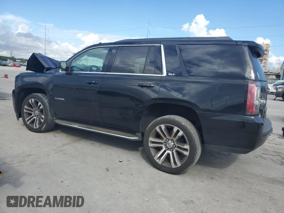 2019 GMC Yukon SLT with VIN 1GKS1BKC1KR155426, listed as a Copart auction lot 69498504 with 161,387 mi miles and Salvage Title. Bid and sale history available at carsss.com. Image 2.