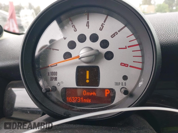 2013 MINI Clubman z VIN WMWZF3C56DT490749, wystawiony jako IAAI lot #42368888 z przebiegiem 163 731 mil mil oraz . Historia ofert i sprzedaży dostępna na DreamBid. Obrazek 7.