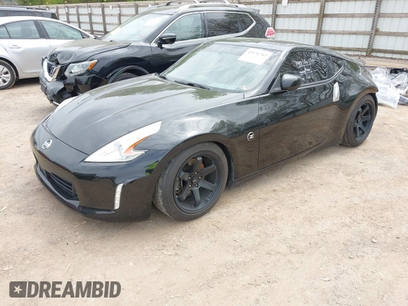 2016 Nissan 370Z with VIN JN1AZ4EHXGM935774, listed as a IAAI auction lot 41976743 with 66,979 mi miles. Bid and sale history available at carsss.com. Image 17.