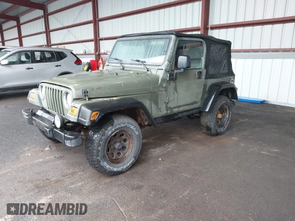 2005 Jeep Wrangler X z VIN 1J4FA39S75P310037, wystawiony jako IAAI lot #42186114 z przebiegiem 154 462 mil mil oraz . Historia ofert i sprzedaży dostępna na DreamBid. Obrazek 2.
