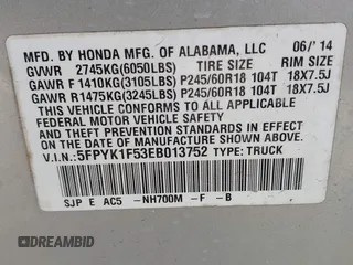 2014 Honda Ridgeline RTL with VIN 5FPYK1F53EB013752, listed as a IAAI auction lot 41886851 with 89,038 mi miles and . Bid and sale history available at DreamBid. Image 9.
