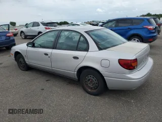 2000 Saturn SL с VIN 1G8ZG5284YZ152285, выставлен на аукционе Copart как лот 59344165 с пробегом Не указан миль и Списание • Salvage title. История ставок и продаж доступна на DreamBid. Изображение 2.