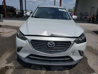 2017 Mazda CX-3 Touring z VIN JM1DKDC78H0150588, wystawiony jako Copart lot #55284205 z przebiegiem 78 923 mil mil oraz Szkoda całkowita • Salvage title. Historia ofert i sprzedaży dostępna na DreamBid. Obrazek 5.