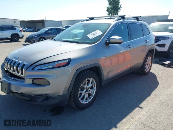 2015 Jeep Cherokee Latitude z VIN 1C4PJMCB0FW749323, wystawiony jako IAAI lot #41852102 z przebiegiem 162 060 mil mil oraz . Historia ofert i sprzedaży dostępna na DreamBid. Obrazek 17.