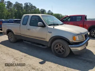 1997 Ford F-150 XL z VIN 1FTEX17LXVNB11737, wystawiony jako Copart lot #52624175 z przebiegiem 94 897 mil mil oraz Szkoda całkowita • Salvage title. Historia ofert i sprzedaży dostępna na DreamBid. Obrazek 4.