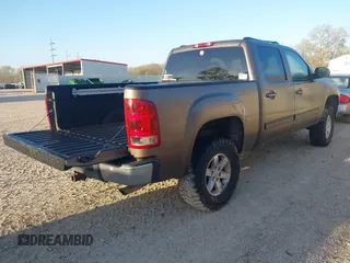 2007 GMC Sierra 1500 with VIN 2GTEK13Y071681590, listed as a IAAI auction lot 41774691 with 240,673 mi miles and . Bid and sale history available at DreamBid. Image 4.