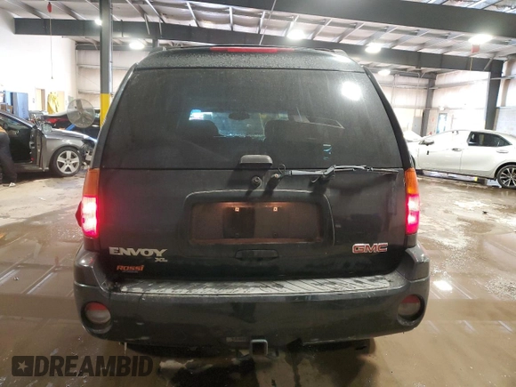 2005 GMC Envoy XL SLE with VIN 1GKET16S456136541, listed as a Copart auction lot 41986845 with 229,576 mi miles and Salvage Title. Bid and sale history available at carsss.com. Image 6.