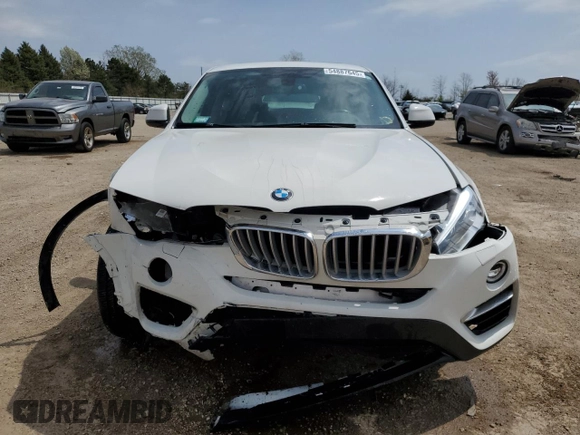 2016 BMW X4 xDrive28i with VIN 5UXXW3C52G0M90018, listed as a Copart auction lot 54887645 with 76,633 mi miles and Salvage title. Bid and sale history available at DreamBid. Image 5.