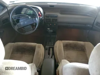 1989 Ford Probe z VIN 1ZVBT21C8K5178908, wystawiony jako Copart lot #87082684 z przebiegiem 84 344 mil mil oraz Tytuł czysty. Historia ofert i sprzedaży dostępna na DreamBid. Obrazek 8.