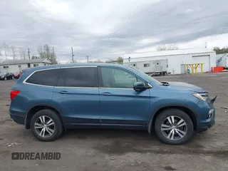 2017 Honda Pilot EX-L with VIN 5FNYF6H50HB101394, listed as a IAAI auction lot 42083318 with 159,359 mi miles and . Bid and sale history available at DreamBid. Image 13.