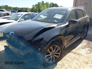 2019 Mazda CX-9 Grand Touring with VIN JM3TCBDY7K0302444, listed as a IAAI auction lot 41998110 with 166,298 mi miles and . Bid and sale history available at DreamBid. Image 2.