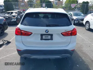 2018 BMW X1 xDrive28i with VIN WBXHT3C37J5K28375, listed as a IAAI auction lot 42039336 with 28,664 mi miles. Bid and sale history available at carsss.com. Image 16.