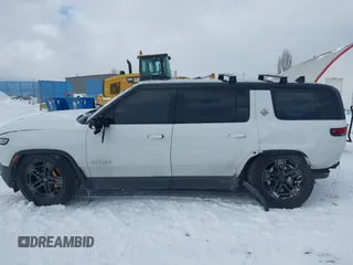 2023 Rivian R1S Adventure z VIN 7PDSGABA9PN015327, wystawiony jako IAAI lot #41484133 z przebiegiem Nie podano mil oraz . Historia ofert i sprzedaży dostępna na DreamBid. Obrazek 15.