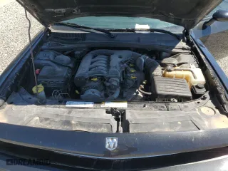 2009 Dodge Challenger SE with VIN 2B3LJ44V49H542199, listed as a Copart auction lot 50326325 with 124,536 mi miles and Salvage Title. Bid and sale history available at carsss.com. Image 11.