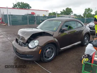 2012 Volkswagen Beetle 2.5L PZEV with VIN 3VWJP7AT2CM638265, listed as a IAAI auction lot 42512449 with 137,129 mi miles and . Bid and sale history available at DreamBid. Image 2.