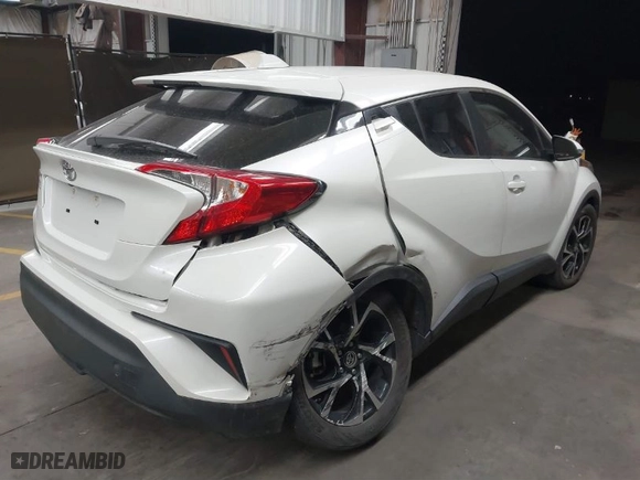 2021 Toyota C-HR LE with VIN JTNKHMBXXM1110696, listed as a IAAI auction lot 41442570 with 44,967 mi miles. Bid and sale history available at carsss.com. Image 4.