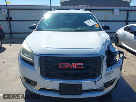 2016 GMC Acadia SLE with VIN 1GKKRNED8GJ205999, listed as a IAAI auction lot 41648295 with 68,906 mi miles and . Bid and sale history available at DreamBid. Image 12.