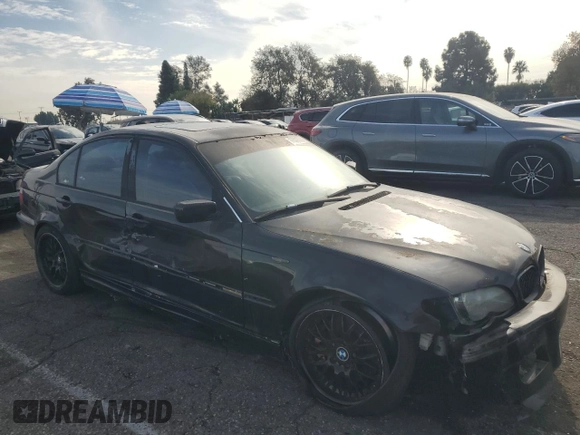2002 BMW 3 Series 330i with VIN WBAEV53452KM00658, listed as a Copart auction lot 82062874 with 106,031 mi miles and Salvage Title. Bid and sale history available at carsss.com. Image 4.