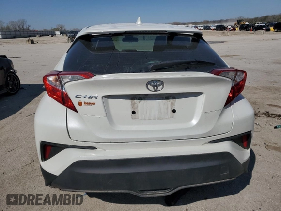 2019 Toyota C-HR XLE with VIN NMTKHMBX2KR098238, listed as a Copart auction lot 52338025 with 57,933 mi miles and Salvage Title. Bid and sale history available at DreamBid. Image 6.