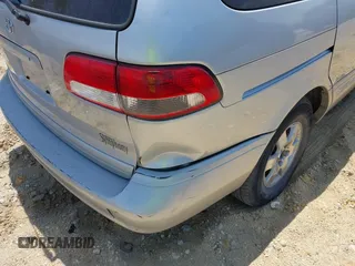 2002 Toyota Sienna LE z VIN 4T3ZF13C32U468403, wystawiony jako IAAI lot #42144703 z przebiegiem 211 578 mil mil oraz . Historia ofert i sprzedaży dostępna na DreamBid. Obrazek 6.
