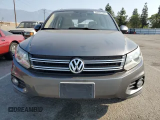 2013 Volkswagen Tiguan SE z VIN WVGAV7AX2DW023093, wystawiony jako Copart lot #64694405 z przebiegiem 137 460 mil mil oraz Szkoda całkowita • Salvage title. Historia ofert i sprzedaży dostępna na DreamBid. Obrazek 5.