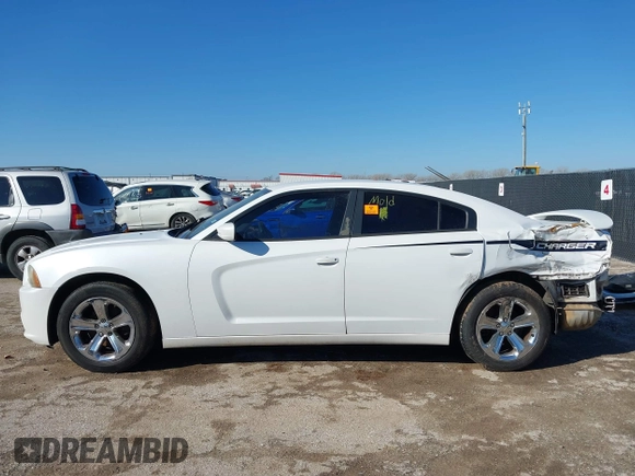 2013 Dodge Charger SE with VIN 2C3CDXBG3DH696590, listed as a IAAI auction lot 41425505 with 234,105 mi miles and . Bid and sale history available at carsss.com. Image 14.
