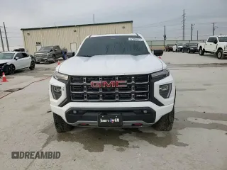 2024 GMC Canyon 4WD AT4 z VIN 1GTP6DEK2R1271647, wystawiony jako Copart lot #47996625 z przebiegiem Nie podano mil oraz Szkoda całkowita • Salvage title. Historia ofert i sprzedaży dostępna na DreamBid. Obrazek 13.