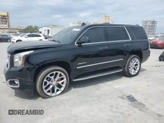 2017 GMC Yukon Denali with VIN 1GKS1CKJ9HR211240, listed as a Copart auction lot 50973015 with 95,484 mi miles and Salvage Title. Bid and sale history available at carsss.com. Image 1.