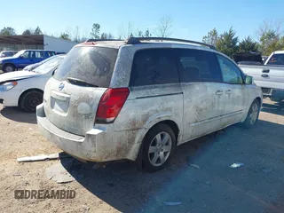2005 Nissan Quest SE with VIN 5N1BV28U65N129959, listed as a IAAI auction lot 41696308 with 157,564 mi miles. Bid and sale history available at carsss.com. Image 4.