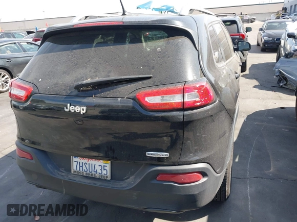 2015 Jeep Cherokee Latitude with VIN 1C4PJLCB9FW627909, listed as a IAAI auction lot 42034667 with 131,739 mi miles and . Bid and sale history available at carsss.com. Image 17.
