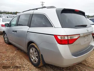 2011 Honda Odyssey LX with VIN 5FNRL5H20BB010579, listed as a IAAI auction lot 41217858 with 209,353 mi miles. Bid and sale history available at carsss.com. Image 3.
