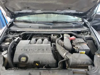2012 Lincoln MKS с VIN 1LNHL9ER6CG807152, выставлен на аукционе Copart как лот 56309925 с пробегом 105 338 миль миль и Списание • Salvage title. История ставок и продаж доступна на DreamBid. Изображение 11.