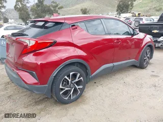 2018 Toyota C-HR XLE with VIN NMTKHMBXXJR016772, listed as a IAAI auction lot 41858304 with 119,278 mi miles. Bid and sale history available at carsss.com. Image 4.