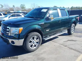 2014 Ford F-150 XL with VIN 1FTFW1ETXEKG42884, listed as a IAAI auction lot 41353551 with 185,563 mi miles. Bid and sale history available at carsss.com. Image 17.