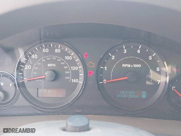 2005 Jeep Grand Cherokee Laredo with VIN 1J4GS48K45C633414, listed as a IAAI auction lot 41797842 with 311,852 mi miles. Bid and sale history available at carsss.com. Image 7.