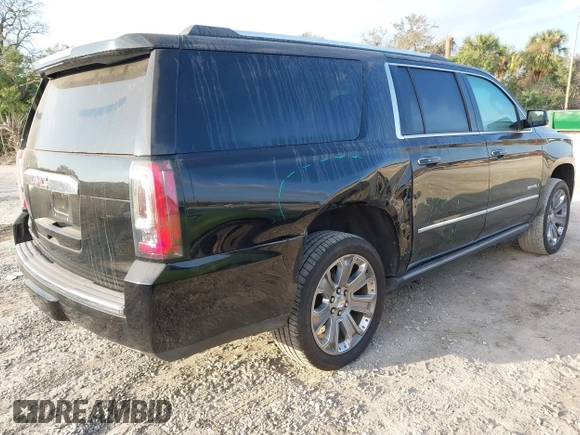 2019 GMC Yukon XL Denali with VIN 1GKS2HKJ2KR226275, listed as a IAAI auction lot 41552828 with 82,069 mi miles. Bid and sale history available at carsss.com. Image 4.