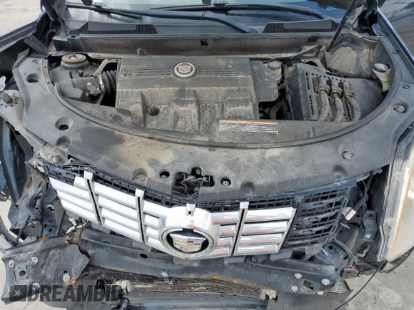2014 Cadillac SRX Performance Collection с VIN 3GYFNCE34ES580069, выставлен на аукционе Copart как лот 60662415 с пробегом 141 107 миль миль и Списание • Salvage title. История ставок и продаж доступна на DreamBid. Изображение 11.