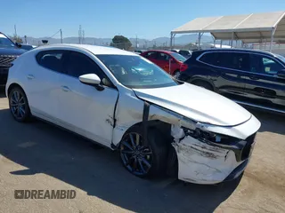 2019 Mazda 3 z VIN JM1BPAJM2K1121511, wystawiony jako IAAI lot #42233606 z przebiegiem 25 440 mil mil oraz . Historia ofert i sprzedaży dostępna na DreamBid. Obrazek 1.