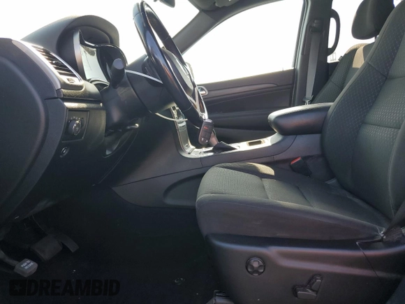 2021 Jeep Grand Cherokee Laredo E with VIN 1C4RJEAGXMC719497, listed as a Copart auction lot 60830315 with 3,873 mi miles and Salvage title. Bid and sale history available at DreamBid. Image 7.
