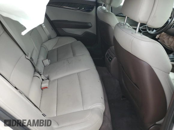 2013 Cadillac ATS Performance z VIN 1G6AC5S34D0150315, wystawiony jako Copart lot #71355404 z przebiegiem Nie podano mil oraz Szkody całkowita. Historia ofert i sprzedaży dostępna na DreamBid. Obrazek 11.