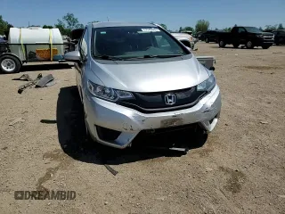 2015 Honda Fit LX с VIN 3HGGK5H5XFM723903, выставлен на аукционе Copart как лот 57249685 с пробегом 90 949 миль миль и Списание • Salvage title. История ставок и продаж доступна на DreamBid. Изображение 13.